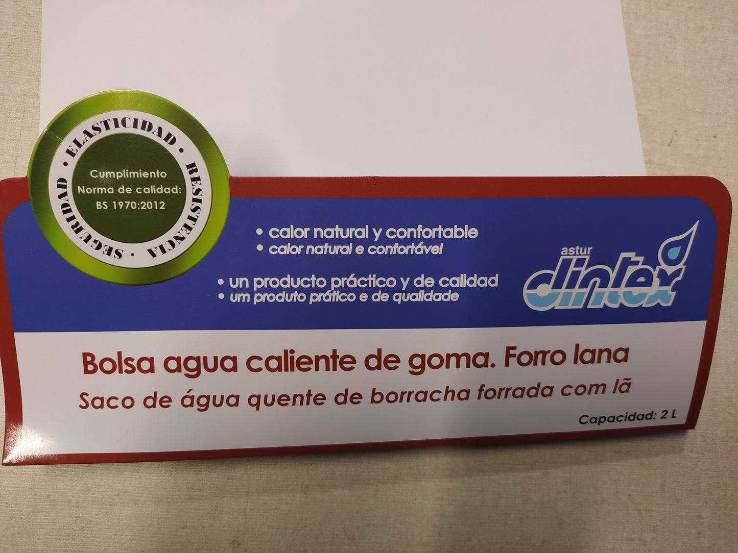 bolsa agua caliente de goma y forro lana, capacidad 2 litros
